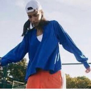 NWOT FP Movement Reflect Layer Long Sleeve Top in l bright blue